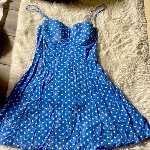 New never worn Blue and White dots material girl dress size medium no tags .